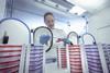 Scientist working on bacterial culture