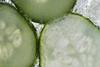 Cucumber in tonic bubbles, close-up