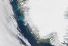Satellite image showing sedimentary plumes seen off the coast Greenland