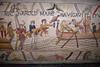 Bayeux medieval tapestry featuring embrodered scenes of battle