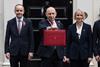 Chancellor holding red budget box