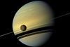 Titan orbiting Saturn