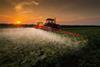 Tractor spraying pesticide