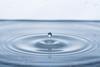 Droplet falling into water