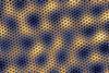 A tiny honeycomb structure of varying widths with the thicker widths forming another honeycomb pattern
