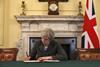Theresa May signs Article 50