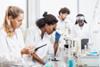 Blurry image of scientsts in the lab