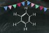 Benzene and bunting in chalk on a blackboard