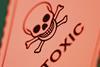 An image showing the toxic warning sign