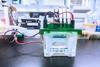 Photo of a Western blot analysis on a lab bench in a lab