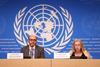 Luis Vayas Valdivieso and Inger Andersen sitting at a desk on a conference stage with the UN logo behind them