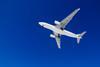 Passenger airplane on a blue sky background.