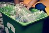 Recycling box filled with clear plastic bottles