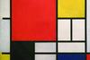 A painting consisting of an irregular grid of white and primary coloured squares and rectangles outlined in black