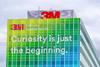 The headquarters of 3M company with a sign saying Curiosity is just the beginning