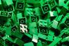 Close-up of pile of small green lego bricks