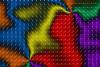 A grid of arrows swirling around points that are also intersections of different colours