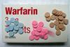 Warfarin tablets, 5mg (pink), 3mg (blue) and 1mg (brown)