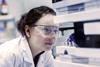 Chemist looking at samples