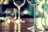 Close up of wine glasses on a wooden table