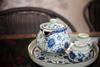 A bone china tea set painted with blue flowers