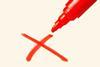 An image showing a marker pen and a rejection cross