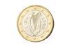 Closeup of an Irish one Euro coin with a Celtic harp as the traditional symbol of Ireland