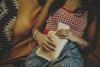 Woman with hot water bottle