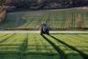 Agriculture - A farmer spraying fertilizer on his crops - North Yorkshire - England.