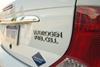 Photo of the hydrogen fuel cell sign seen on the back of a hydrogen-powered vehicle