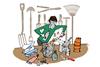 Man placing substance in a bucket, with gardening tools in the background