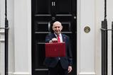 Chancellor holding red budget box