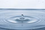Droplet falling into water