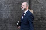 Jonathan Reynolds walking along Downing Street