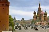 A military parade passes St Basil's cathedral, Red Square, Moscow