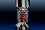 A molecular hexagonal lattice with a red spiral in a clear substance between two metal rods.
