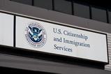 The sign on a building for the US Department of Homeland Security US Citizenship and Immigration Services