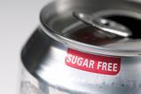 Close up of the rim of an open can of soft drink which has a label which says Sugar Free