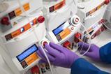 Image showing Syrris Asia Syringe Pump being used by a chemist