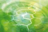 Chemical formulations on a green background to represent sustainable