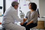 Female patient in consultation with doctor as part of a clinical trial