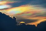 Clouds high in the atmosphere in rainbow colours like mother of pearl