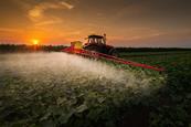 Tractor spraying pesticide