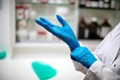 Nitrile glove being put on