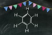 Benzene and bunting in chalk on a blackboard