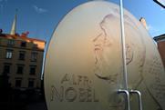 Portrait of Alfred Nobel at door entrance in the Nobel Prize Museum is located in the Old Town of Stockholm