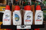 Bottles of brand name Round up weed killer on sale in a large hardware store