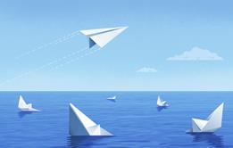 Paper boats sinking while paper plane flies off