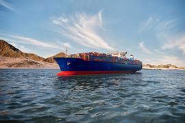 3D render illustration of a cargo ship in the Persian Gulf representing global trade risk and Hormuz logistics blockade during Iran and Israel conflict.