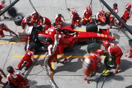 Scuderia Ferrari Marlboro crews do pit-stop practice at the 2009 F1 Petronas Malaysian Grand Prix April 4, 2009 in Sepang Malaysia.